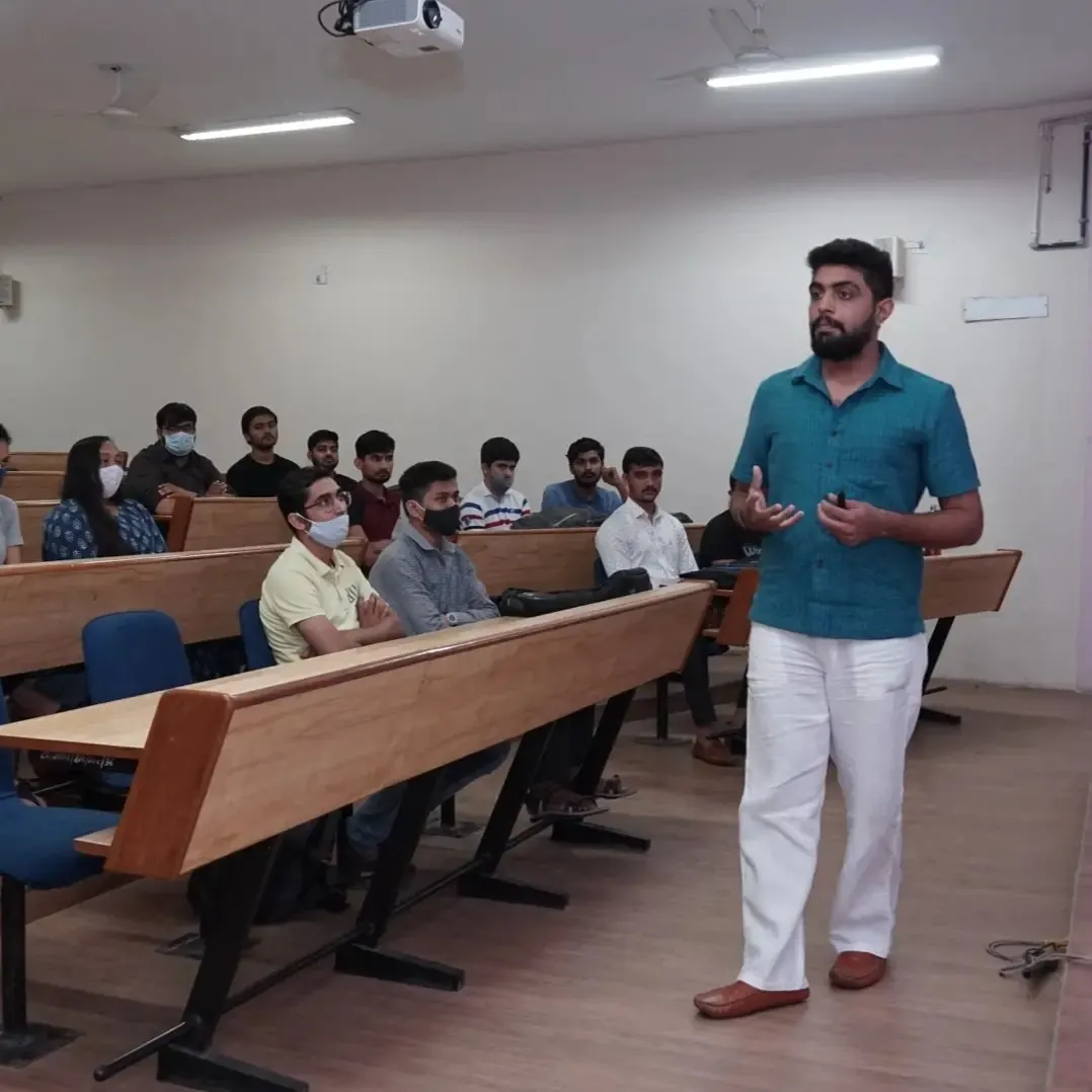 Prinkit Patel conducting a seminar with audience engagement